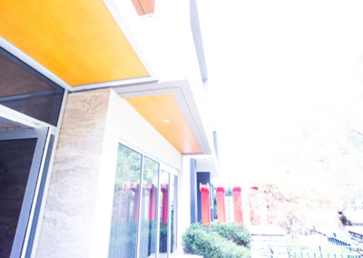 A house adorned with large pieces of sheet metal fabrication