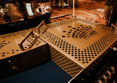Customised bench in Perth, crafted from perforated sheet metal for durability and style