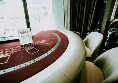 A modern blackjack casino table crafted from sheet metal fabrication with aluminium plate in Perth