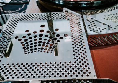Perforated sheet metal sample crafted from aluminium plate in Perth