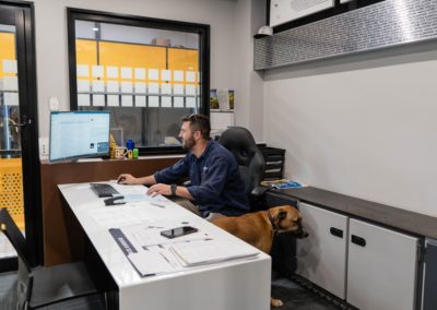 Custom Aluminium Director Jake Whately Working at the Headquarters Office