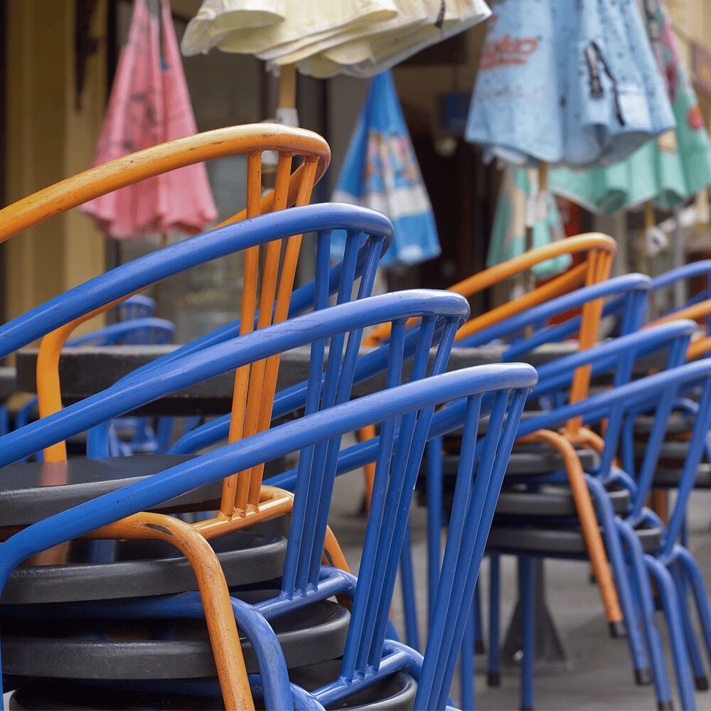 Aluminium Seating - Chairs stacked outdoors